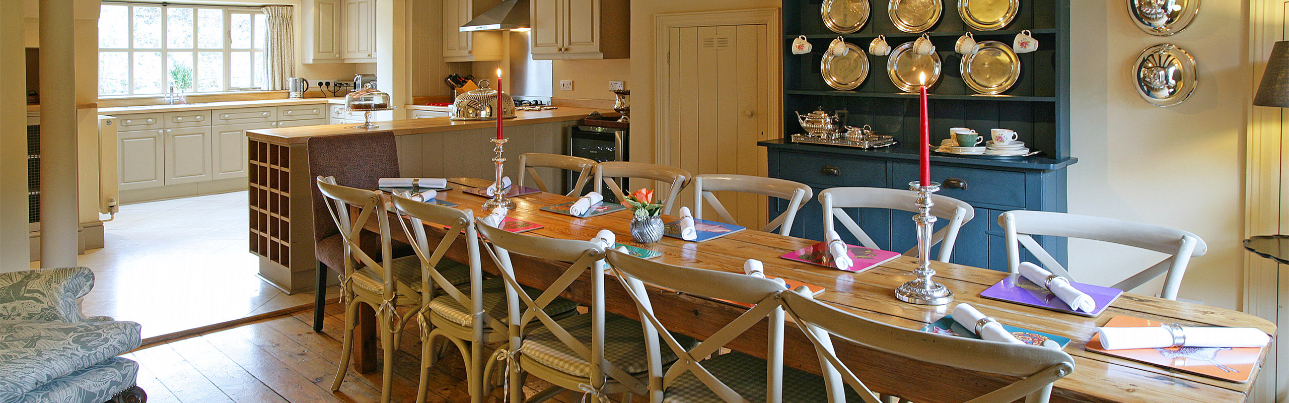 Wide-angle view of the kitchen and dining room of The Dene