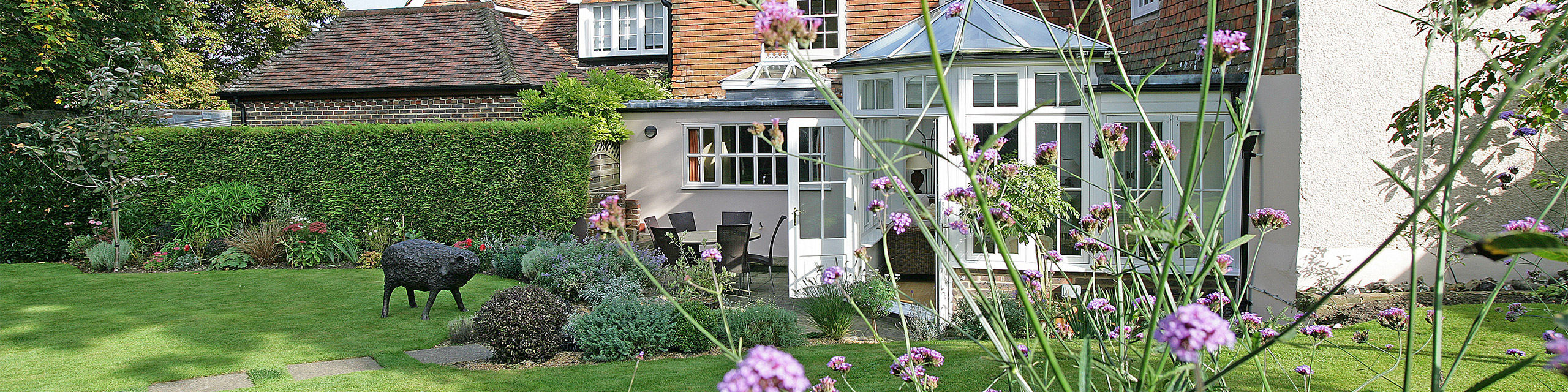 View of The Dene garden and conservatory