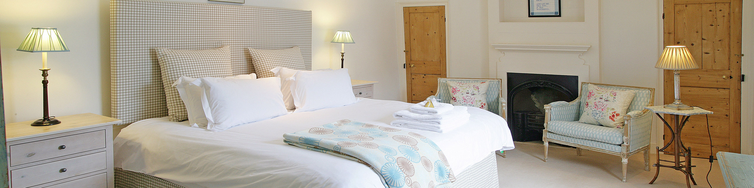 Wide-angle view of a bedroom at The Dene